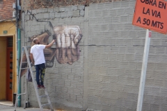 84. Street artist at work