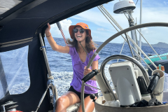 18.-Chloe-at-the-helm