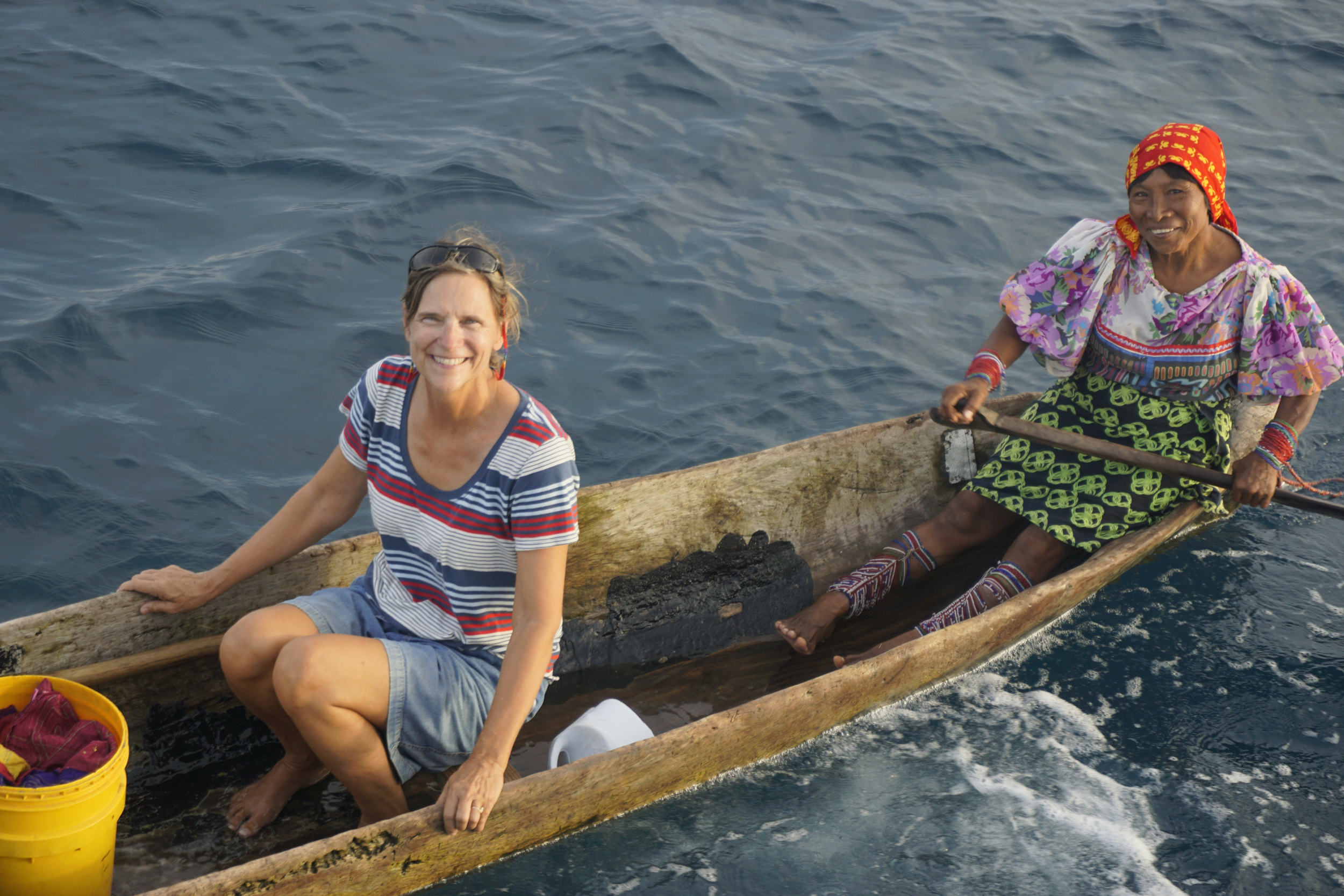 37. Ride in a dugout canoe, the woman row