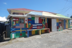 11. Shop in Canouan flying lots of colors